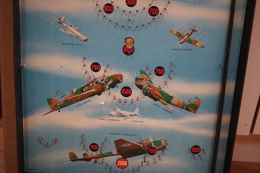 WWII aviation interest; a 1940s bagatelle table pinball game by Kay, Made in England, entitled ‘Sons of the Air’, of hardboard construction, with applied paper surface with images of 1940s RAF aircraft, including a Hawke